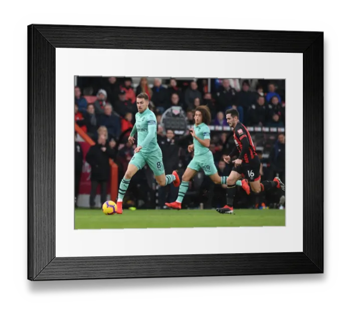Framed Print : Arsenal's Ramsey Outmaneuvers Bournemouth's Cook in Premier League Clash