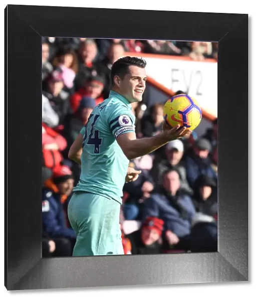 Granit Xhaka: Arsenal's Midfield Maestro in Action Against AFC Bournemouth, Premier League 2018-19