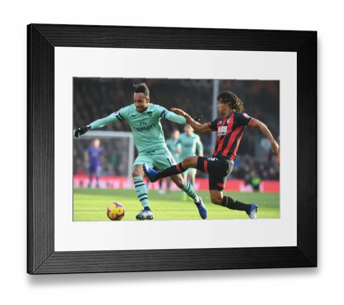 Framed Print : Aubameyang vs Ake: Intense Battle in AFC Bournemouth vs Arsenal FC Premier League Clash
