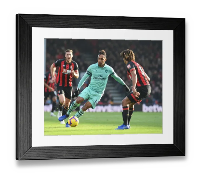 Framed Print : Aubameyang vs. Ake: Intense Battle in AFC Bournemouth vs. Arsenal FC Premier League Clash Framed Print : Aubameyang vs. Ake: Intense Battle in AFC Bournemouth vs. Arsenal FC Premier League Clash