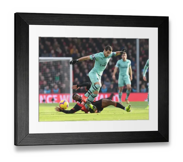 Framed Print : Mkhitaryan vs Lerma: Intense Battle in AFC Bournemouth vs Arsenal FC Premier League Clash