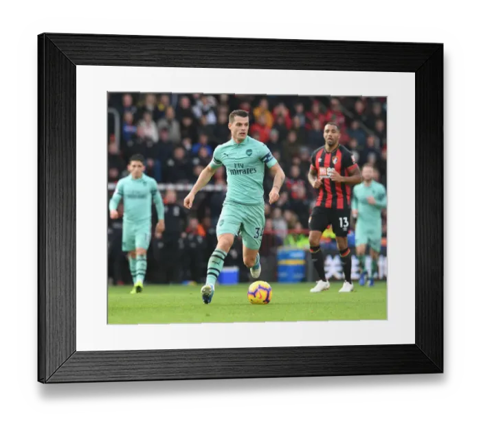 Framed Print : Granit Xhaka: Arsenal's Midfield Maestro at AFC Bournemouth, Premier League 2018-19