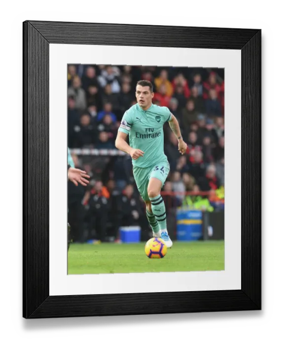 Framed Print : Granit Xhaka: Arsenal Midfielder in Action Against AFC Bournemouth, Premier League 2018-19 Framed Print : Granit Xhaka: Arsenal Midfielder in Action Against AFC Bournemouth, Premier League 2018-19