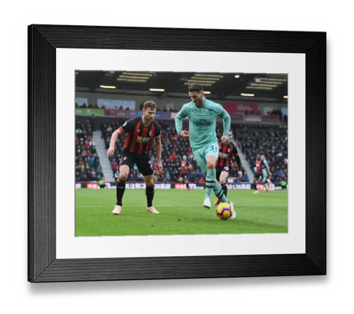 Framed Print : Sead Kolasinac vs. Simon Francis: Intense Battle in AFC Bournemouth vs. Arsenal FC Premier League Clash