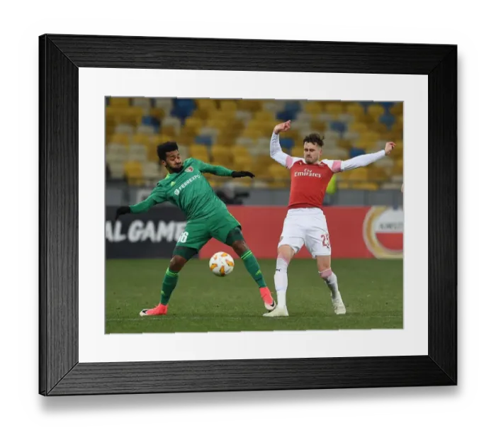 Framed Print : Clash in Ukraine: Jenkinson Faces Off Against Artur in Arsenal's Europa League Battle with Vorskla Poltava