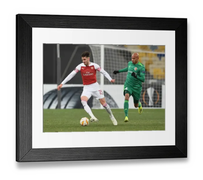 Framed Print : Arsenal's Jenkinson Clashes with Vorskla's Careca in Europa League Showdown