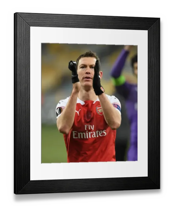 Framed Print : Stephan Lichtsteiner Celebrates with Arsenal Fans after UEFA Europa League Victory over Vorskla Poltava Framed Print : Stephan Lichtsteiner Celebrates with Arsenal Fans after UEFA Europa League Victory over Vorskla Poltava