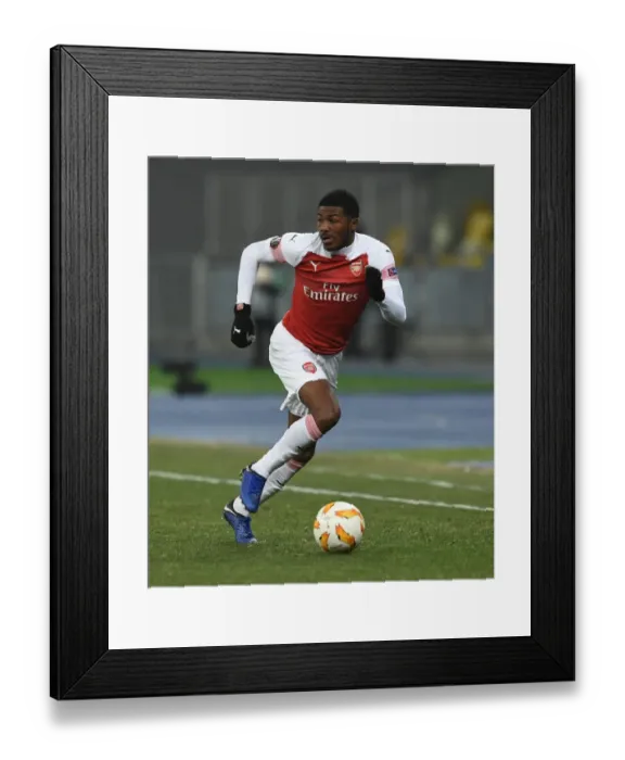Framed Print : Ainsley Maitland-Niles in Action for Arsenal against Vorskla Poltava in UEFA Europa League Framed Print : Ainsley Maitland-Niles in Action for Arsenal against Vorskla Poltava in UEFA Europa League