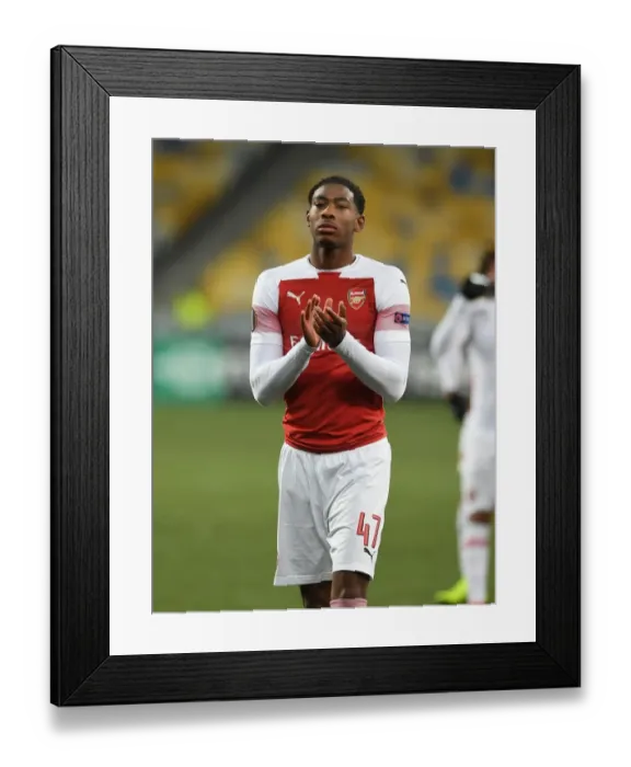 Framed Print : Zech Medley Celebrates with Arsenal Fans after Europa League Victory over Vorskla Poltava