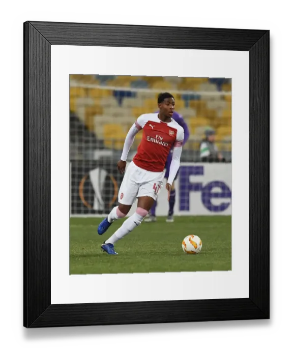 Framed Print : Zech Medley in Action: Arsenal vs. Vorskla Poltava, UEFA Europa League