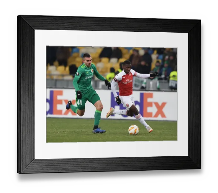 Framed Print : Arsenal's Eddie Nketiah Faces Off Against Ardin Dallku in Europa League Clash Framed Print : Arsenal's Eddie Nketiah Faces Off Against Ardin Dallku in Europa League Clash