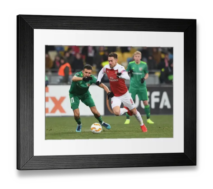 Framed Print : Ramsey vs. Sharpar: A Europa League Showdown at Vorskla Poltava