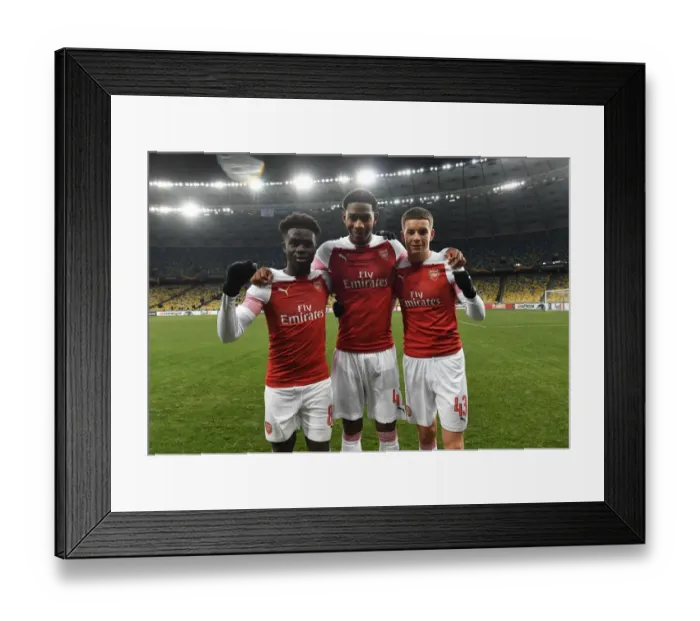 Framed Print : Arsenal Debutants: Saka, Medley, and Gilmour after UEFA Europa League Match vs Vorskla Poltava