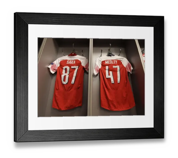 Framed Print : Arsenal Changing Room: Preparing for FC Vorskla Poltava (2018-19) - Europa League Shirts Hang in Readiness