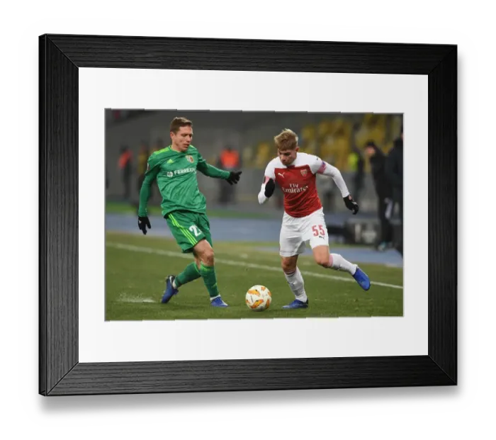 Framed Print : Emile Smith Rowe vs Vadym Sapai: Clash in the Europa League between Arsenal and Vorskla Poltava Framed Print : Emile Smith Rowe vs Vadym Sapai: Clash in the Europa League between Arsenal and Vorskla Poltava