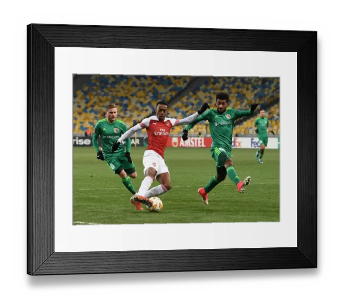 Framed Print : Joe Willock vs Artur: Clash in the Europa League between Arsenal and Vorskla Poltava Framed Print : Joe Willock vs Artur: Clash in the Europa League between Arsenal and Vorskla Poltava