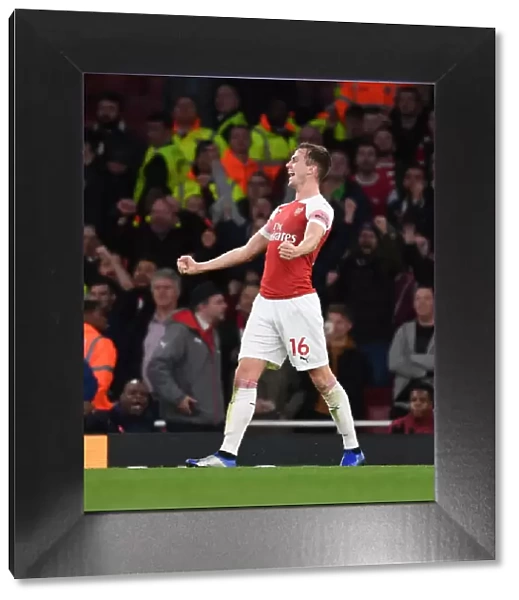 Rob Holding Celebrates Arsenal's Win Over Tottenham Hotspur in the Premier League