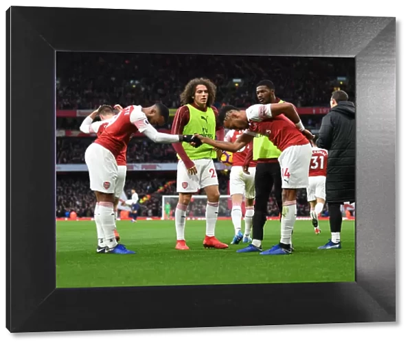 Unstoppable Arsenal Strikers: Lacazette and Aubameyang's Triumphant Goal Celebration Against Tottenham in the 2018-19 Premier League Clash