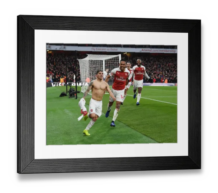 Framed Print : Arsenal's Torreira and Aubameyang Celebrate Goals Against Tottenham in Premier League Showdown