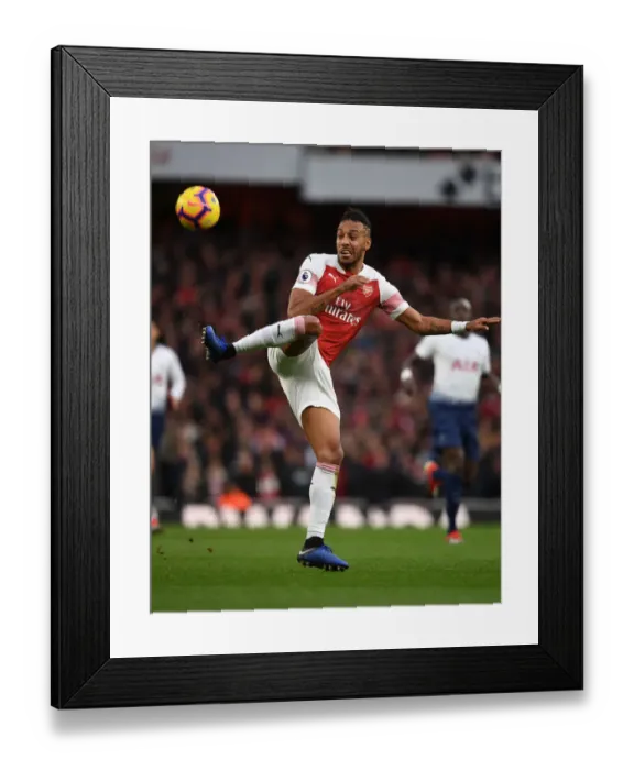 Framed Print : Arsenal's Aubameyang Faces Off Against Tottenham in Premier League Clash Framed Print : Arsenal's Aubameyang Faces Off Against Tottenham in Premier League Clash