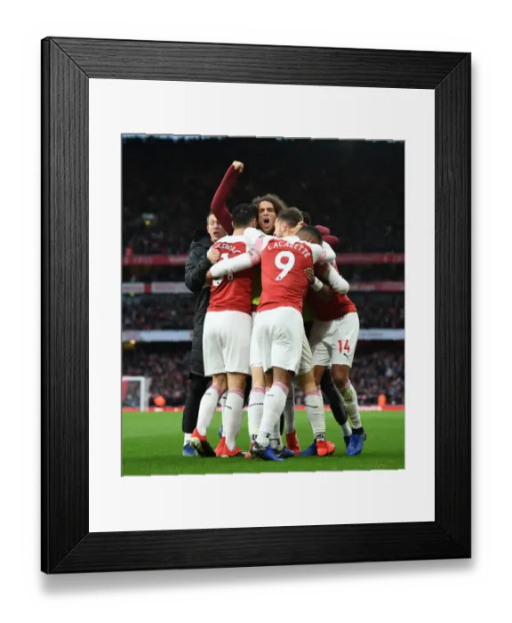 Framed Print : Arsenal Celebrate Third Goal Against Tottenham in Premier League Clash Framed Print : Arsenal Celebrate Third Goal Against Tottenham in Premier League Clash