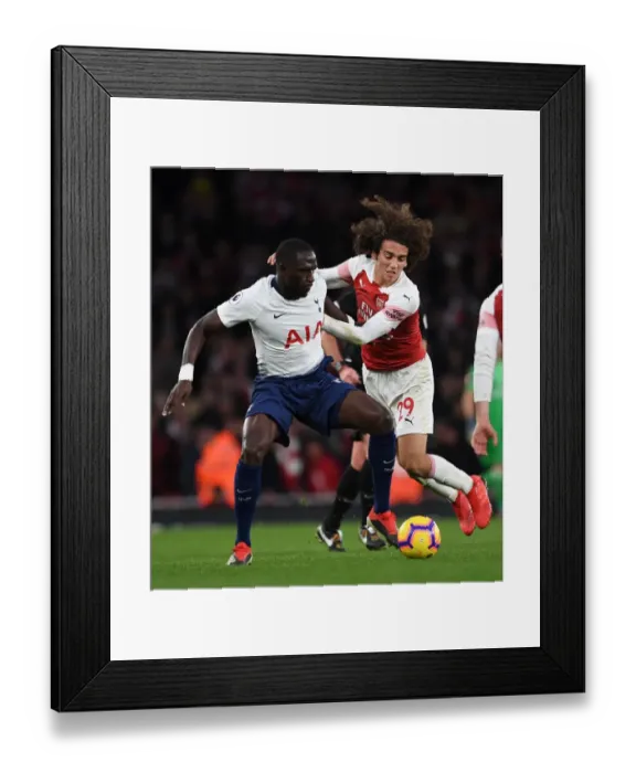 Framed Print : Clash of Midfielders: Guendouzi vs. Sissoko in the Arsenal vs. Tottenham Rivalry