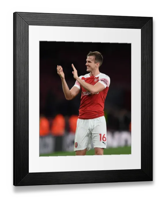 Framed Print : Arsenal's Rob Holding Celebrates with Fans after Derby Win over Tottenham