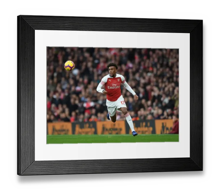 Framed Print : Arsenal's Alex Iwobi Faces Off Against Tottenham in Premier League Showdown Framed Print : Arsenal's Alex Iwobi Faces Off Against Tottenham in Premier League Showdown