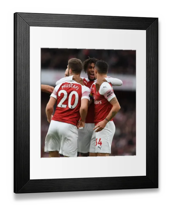 Framed Print : Arsenal's Mustafi, Xhaka, and Iwobi Celebrate Penalty Against Tottenham Framed Print : Arsenal's Mustafi, Xhaka, and Iwobi Celebrate Penalty Against Tottenham