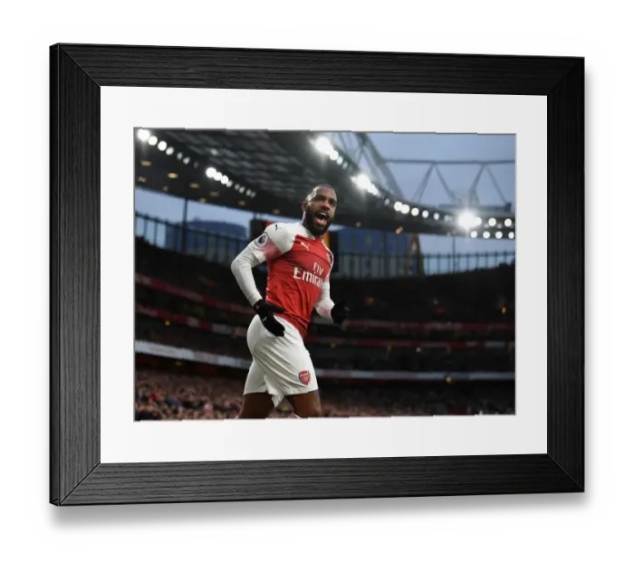 Framed Print : Arsenal's Alexandre Lacazette Goes Head-to-Head with Tottenham in Premier League Showdown