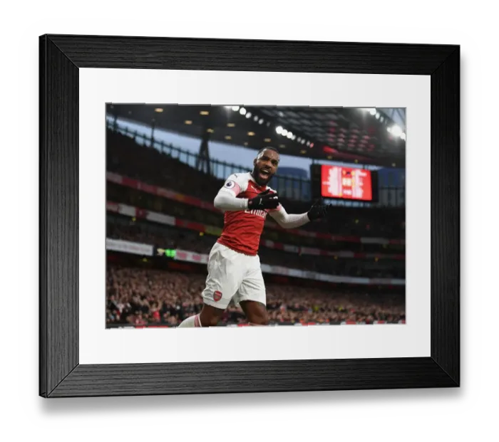 Framed Print : Arsenal's Alexandre Lacazette Goes Head-to-Head with Tottenham in Premier League Showdown