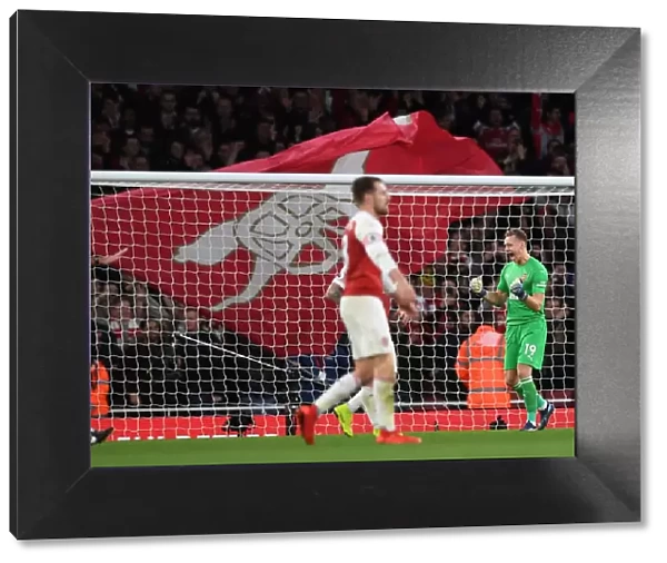 Celebrating the Win: Bernd Leno's Exultant Moment after Arsenal's Victory over Tottenham Hotspur (2018-19)