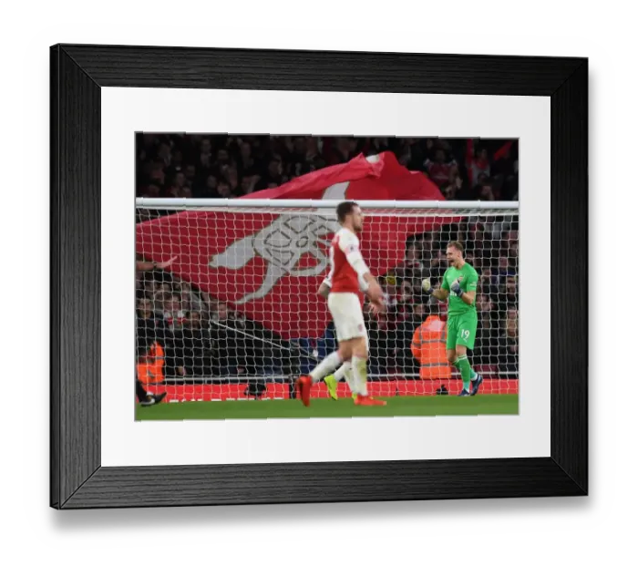 Framed Print : Celebrating the Win: Bernd Leno's Exultant Moment after Arsenal's Victory over Tottenham Hotspur (2018-19)