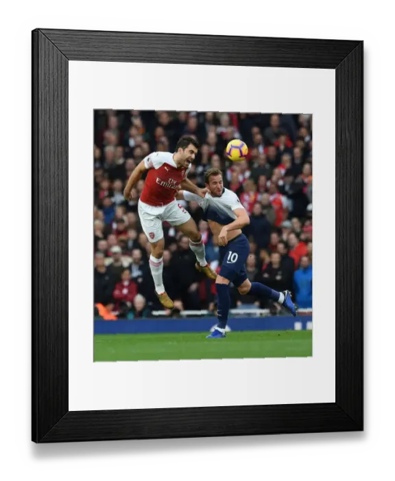Framed Print : Clash of Titans: Sokratis vs. Harry Kane - Arsenal vs. Tottenham's Battle for Premier League Supremacy (2018-19): A Football Rivalry Ignited