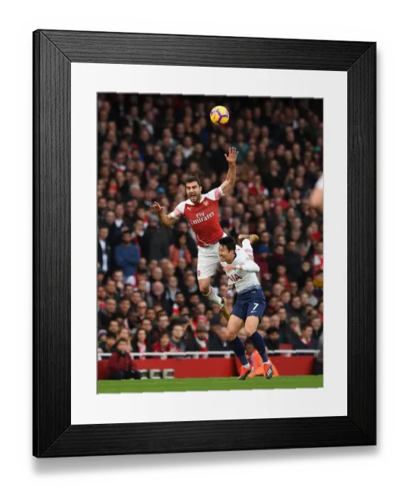 Framed Print : Clash of Titans: Sokratis vs. Son in the North London Derby Framed Print : Clash of Titans: Sokratis vs. Son in the North London Derby