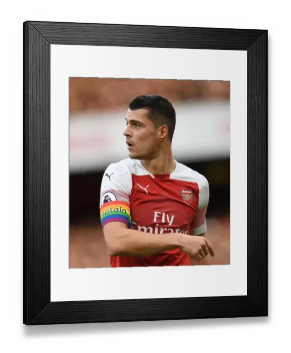 Framed Print : Granit Xhaka in Action: Arsenal vs. Tottenham Premier League Clash, London 2018