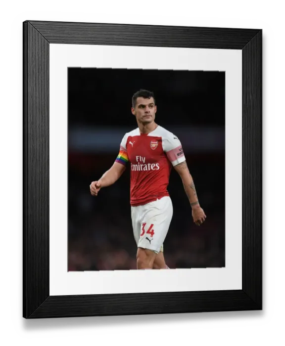 Framed Print : Granit Xhaka: Arsenal vs. Tottenham Battle in the Premier League 2018-19 Framed Print : Granit Xhaka: Arsenal vs. Tottenham Battle in the Premier League 2018-19