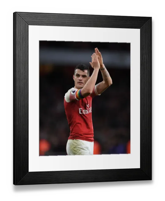 Framed Print : Arsenal's Granit Xhaka Rallies Fans After Arsenal v Tottenham Premier League Clash Framed Print : Arsenal's Granit Xhaka Rallies Fans After Arsenal v Tottenham Premier League Clash