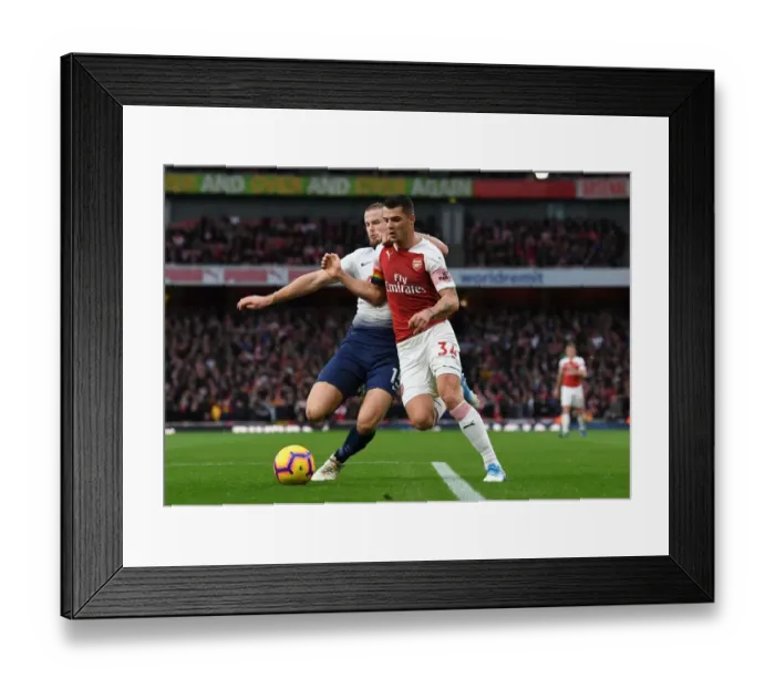 Framed Print : Clash of Midfield Titans: Xhaka vs. Dier - Arsenal vs. Tottenham, Premier League Framed Print : Clash of Midfield Titans: Xhaka vs. Dier - Arsenal vs. Tottenham, Premier League