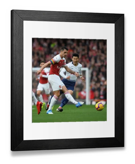 Framed Print : Xhaka vs. Son: Intense Battle in the Midfield - Arsenal vs. Tottenham, Premier League 2018-19 Framed Print : Xhaka vs. Son: Intense Battle in the Midfield - Arsenal vs. Tottenham, Premier League 2018-19
