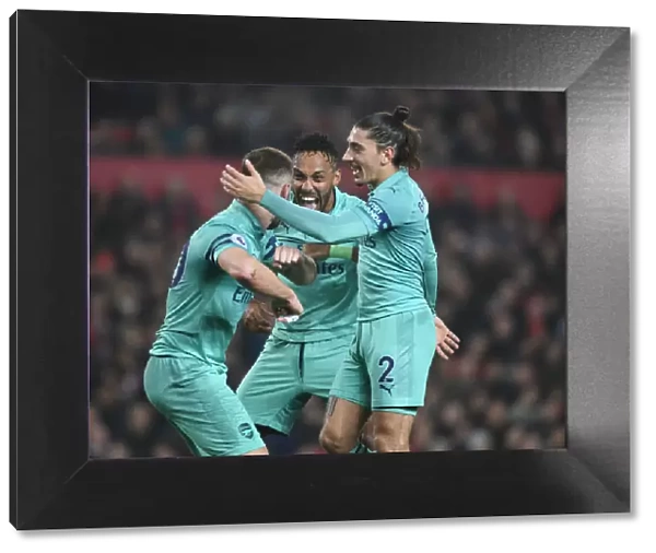 Arsenal's Mustafi, Aubameyang, and Bellerin Celebrate Goal Against Manchester United (2018-19)