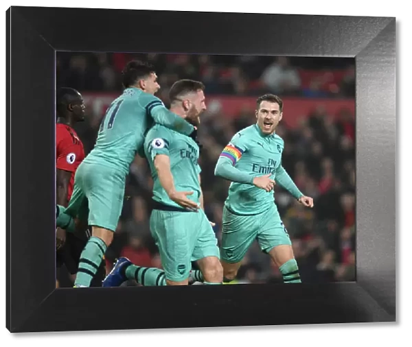 Ramsey and Mustafi Celebrate Arsenal's Goal Against Manchester United (2018-19)