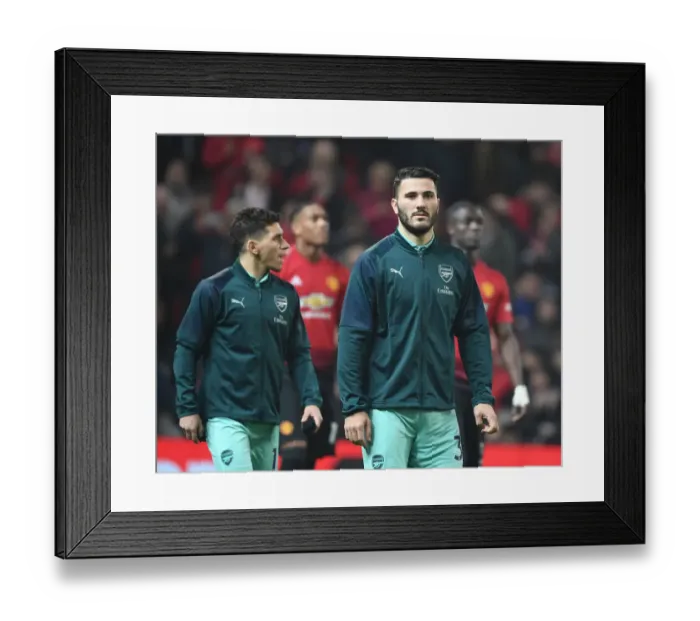 Framed Print : Sead Kolasinac: Arsenal Star's Intense Focus Before Manchester United Clash