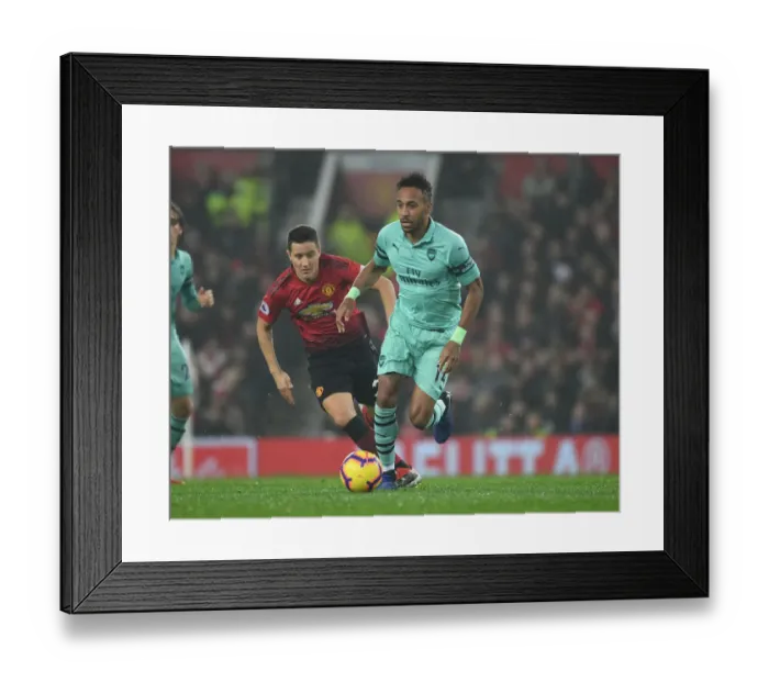 Framed Print : Aubameyang Outsmarts Herrera: Premier League Battle - Arsenal vs Manchester United, 2018-19 Framed Print : Aubameyang Outsmarts Herrera: Premier League Battle - Arsenal vs Manchester United, 2018-19