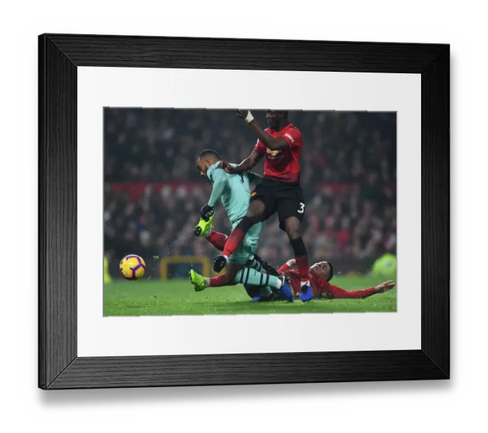 Framed Print : Alexandre Lacazette Scores Dramatic Goal Against Manchester United's Rojo and Bailly (Premier League 2018-19)