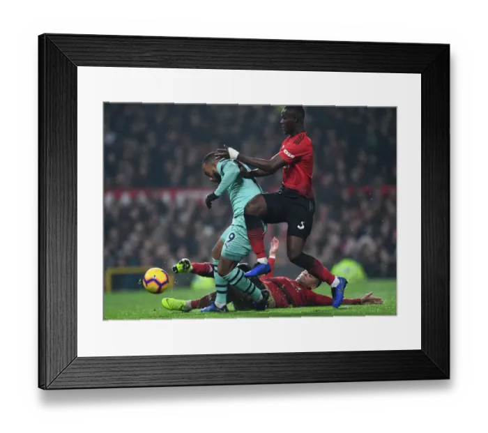 Framed Print : Lacazette Scores Dramatic Goal Past Rojo and Bailly in Manchester United vs. Arsenal Clash (2018-19)