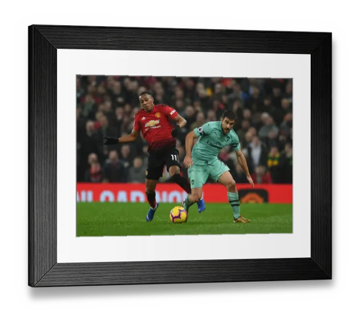 Framed Print : Manchester United vs Arsenal: Sokratis Faces Off Against Anthony Martial in Premier League Clash