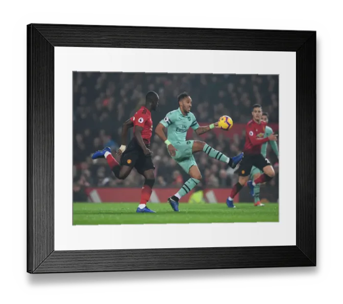 Framed Print : Clash at Old Trafford: Aubameyang vs. Bailly in the Manchester United vs. Arsenal Premier League Showdown Framed Print : Clash at Old Trafford: Aubameyang vs. Bailly in the Manchester United vs. Arsenal Premier League Showdown