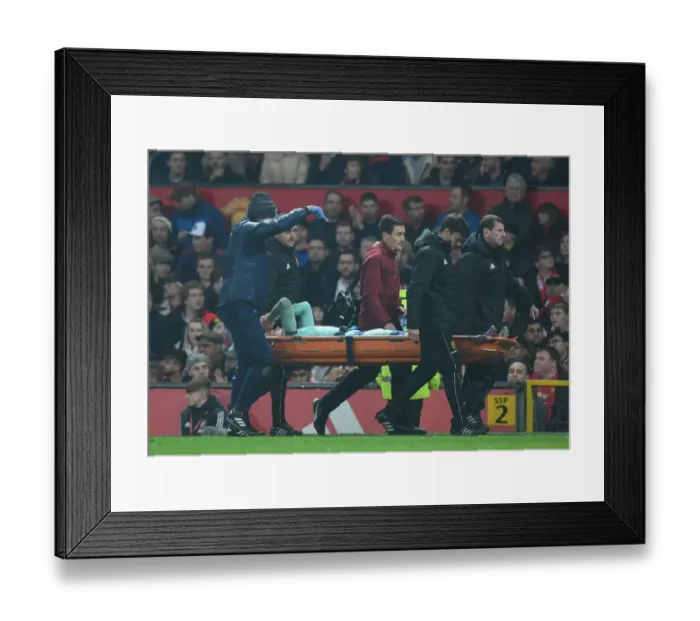 Framed Print : Rob Holding Injured: Manchester United vs Arsenal FC, Premier League 2018-19