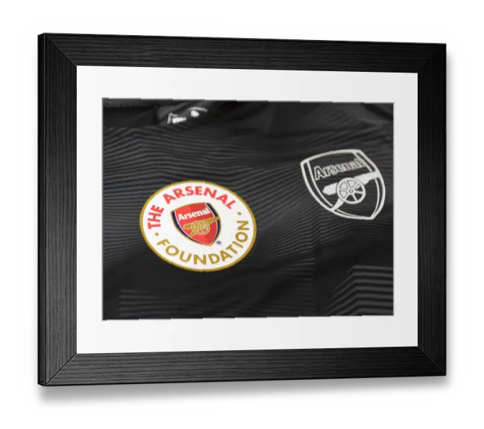 Framed Print : Arsenal Foundation: Uniting for Warm-Up at Arsenal vs. Huddersfield Match